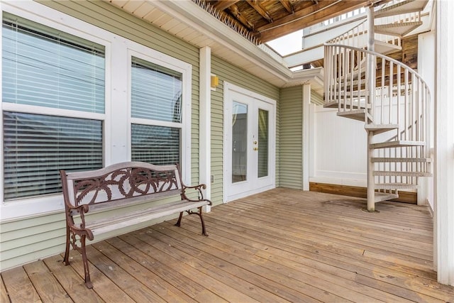 wooden terrace featuring french doors