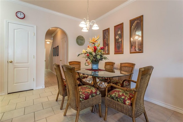 tiled dining space featuring ornamental molding and a notable chandelier