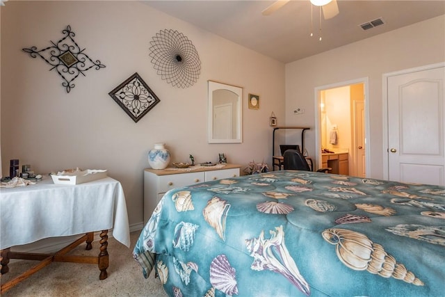 bedroom featuring carpet, ceiling fan, and connected bathroom