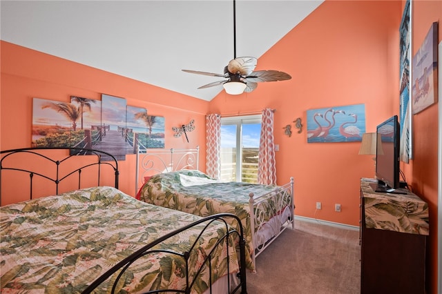 bedroom featuring ceiling fan, carpet flooring, and lofted ceiling