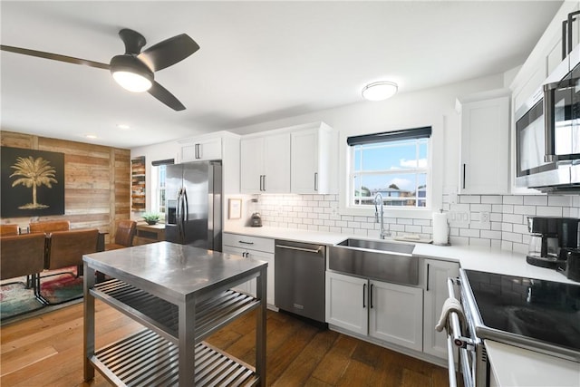 500 Royal Palm Ln, Port Aransas, TX 78373 - kitchen featuring appliances with stainless steel finishes, a sink, light countertops, decorative backsplash, and recessed lighting