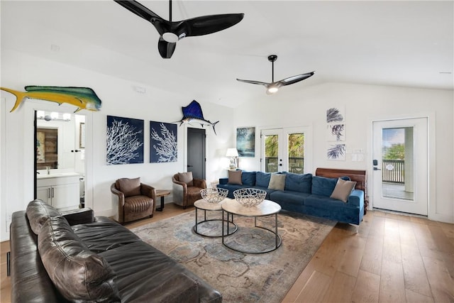500 Royal Palm Ln, Port Aransas, TX 78373 - living room featuring french doors, ceiling fan, wood-type flooring, plenty of natural light, and vaulted ceiling
