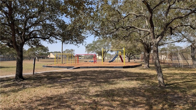 community play area with a lawn