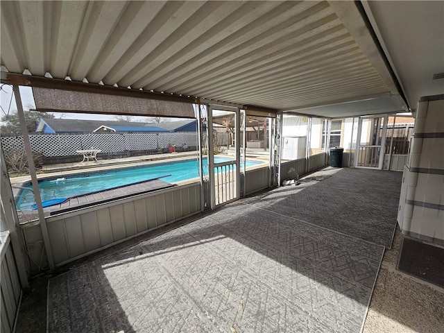 view of pool with a fenced in pool, a patio area, and fence