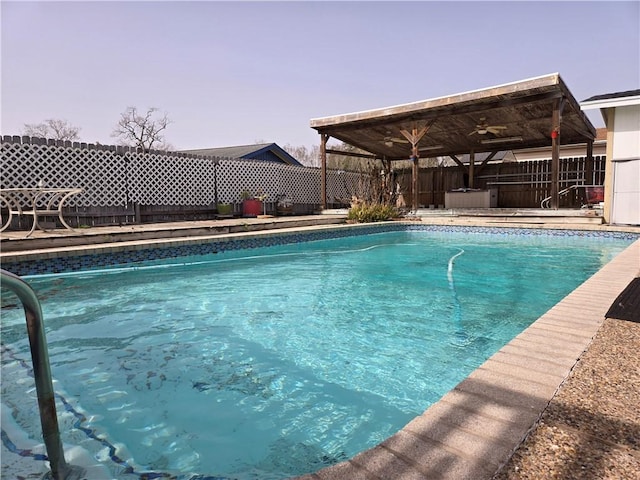 view of swimming pool with a fenced in pool and a fenced backyard