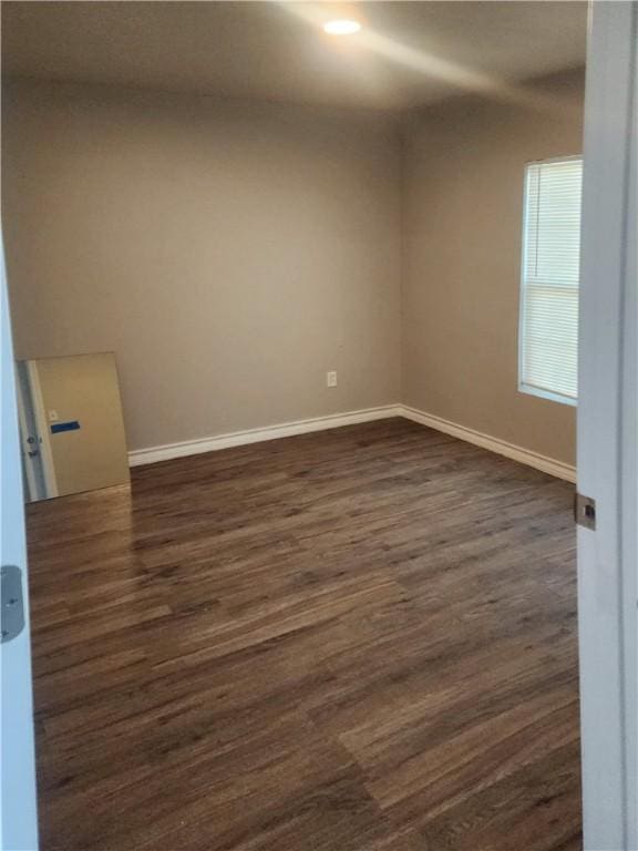 1021 Dona Dr, Corpus Christi, TX 78407 - unfurnished room featuring dark wood finished floors, baseboards, and recessed lighting