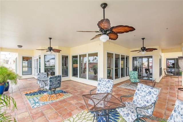 view of patio / terrace featuring a ceiling fan and outdoor dining area