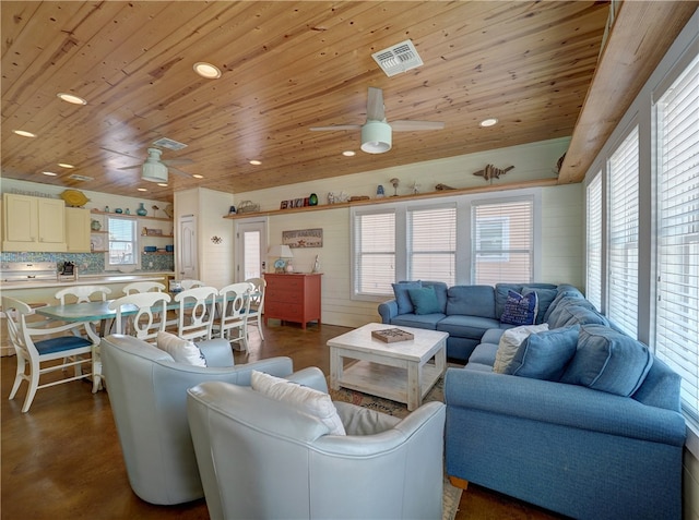 living room featuring wooden ceiling and ceiling fan