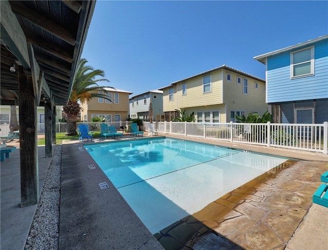 view of swimming pool featuring a patio