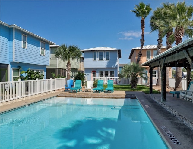 view of swimming pool featuring a patio area