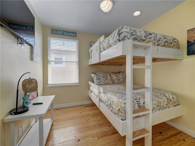 bedroom featuring hardwood / wood-style floors