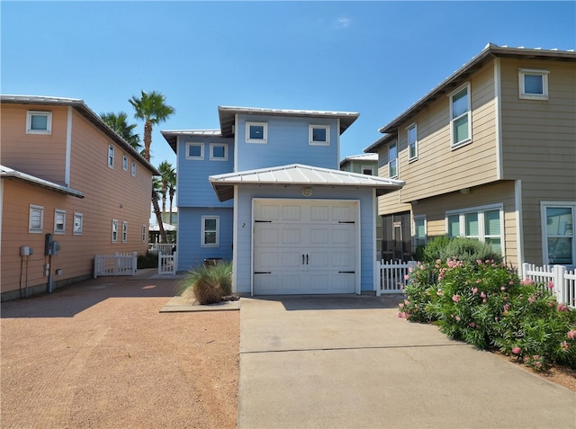 view of front of property featuring a garage