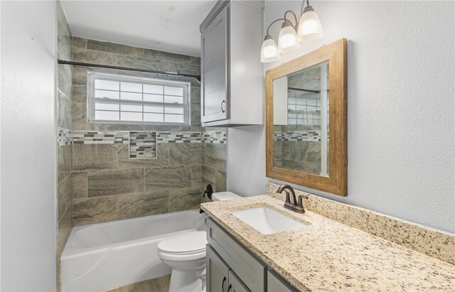 1333 Prince Dr, Corpus Christi, TX 78412 - bathroom featuring toilet, vanity, and washtub / shower combination