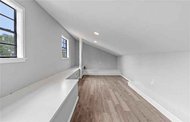 1333 Prince Dr, Corpus Christi, TX 78412 - additional living space featuring light wood finished floors, vaulted ceiling, recessed lighting, and baseboards
