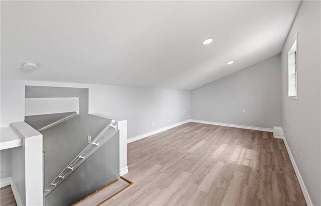 1333 Prince Dr, Corpus Christi, TX 78412 - bonus room with wood finished floors, baseboards, vaulted ceiling, and recessed lighting