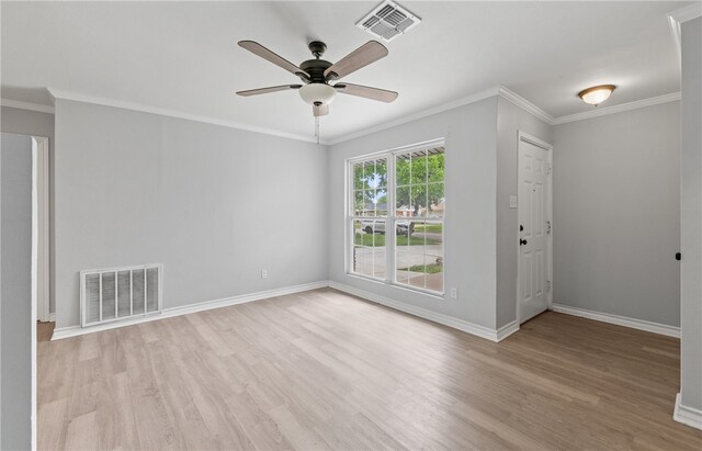 1333 Prince Dr, Corpus Christi, TX 78412 - empty room featuring wood finished floors, crown molding, a ceiling fan, and baseboards
