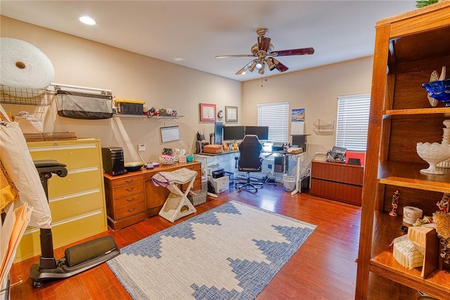 home office with recessed lighting, wood finished floors, and a ceiling fan