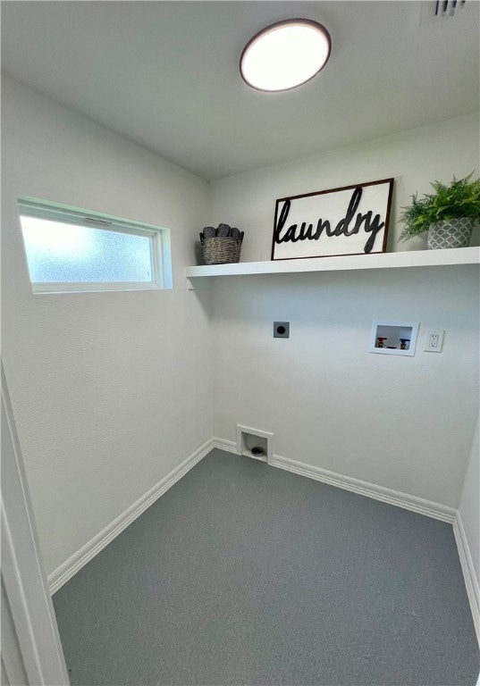 washroom with hookup for an electric dryer, washer hookup, and carpet floors