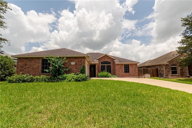 14426 Pentridge Dr, Corpus Christi, TX 78410 - single story home featuring a front yard and brick siding