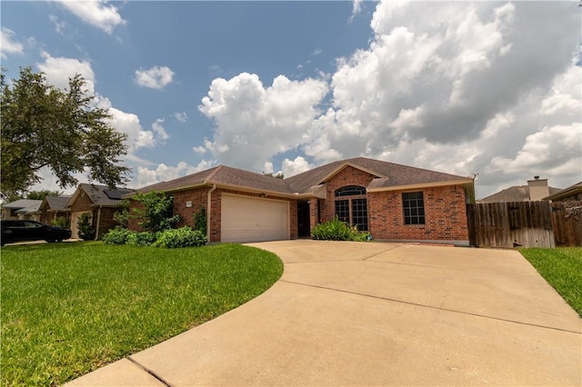 14426 Pentridge Dr, Corpus Christi, TX 78410 - ranch-style home with brick siding, a garage, and driveway