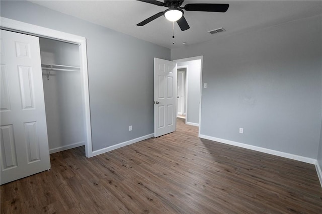 3809 Capri Dr, Corpus Christi, TX 78415 - unfurnished bedroom featuring wood finished floors, baseboards, a closet, and a ceiling fan