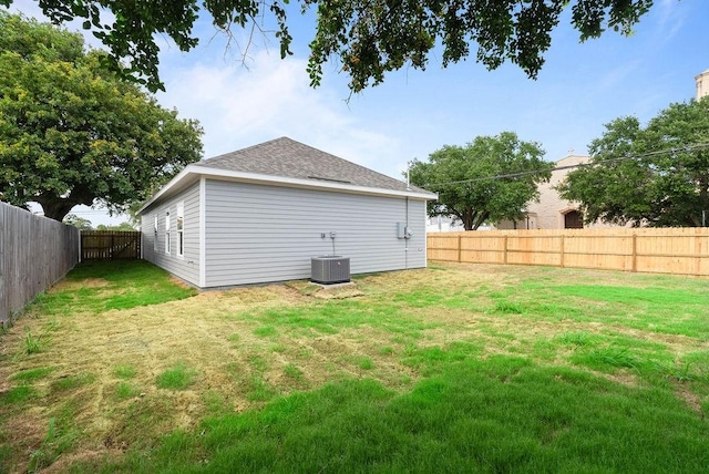 2201 Morris St, Corpus Christi, TX 78405 - rear view of house with a fenced backyard and roof with shingles