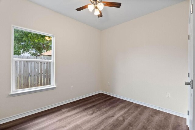 2201 Morris St, Corpus Christi, TX 78405 - unfurnished room with a ceiling fan and wood finished floors
