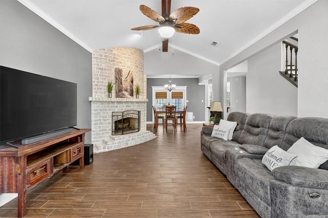 7609 Stony Brook Dr, Corpus Christi, TX 78413 - living area featuring ceiling fan, wood finished floors, a chandelier, a fireplace, and ornamental molding