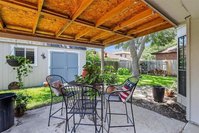 7609 Stony Brook Dr, Corpus Christi, TX 78413 - fenced backyard with a patio and outdoor dining area
