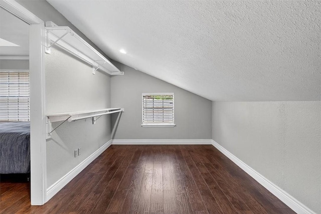 7609 Stony Brook Dr, Corpus Christi, TX 78413 - spacious closet with wood finished floors and vaulted ceiling