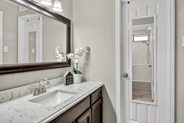 7609 Stony Brook Dr, Corpus Christi, TX 78413 - bathroom featuring a textured wall and vanity