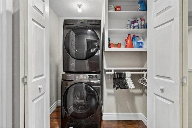 7609 Stony Brook Dr, Corpus Christi, TX 78413 - laundry area featuring estacked washer and dryer and wood finished floors