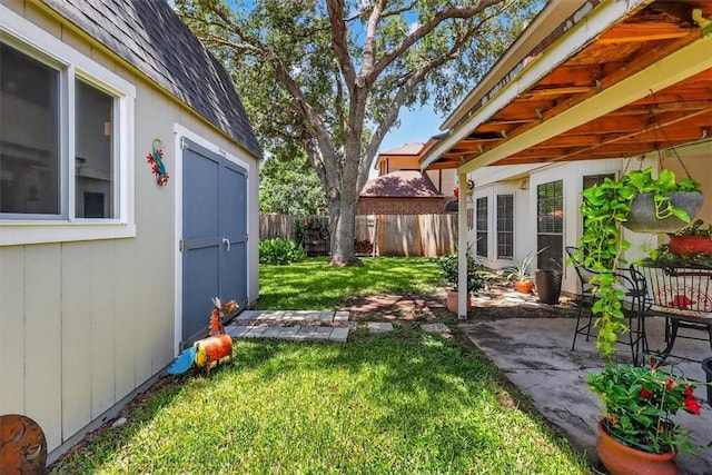 7609 Stony Brook Dr, Corpus Christi, TX 78413 - fenced backyard featuring a shed and a patio