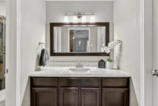 7609 Stony Brook Dr, Corpus Christi, TX 78413 - bathroom featuring a textured wall and vanity