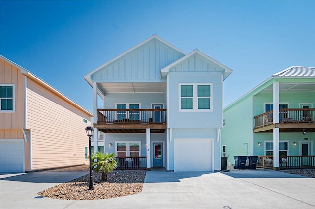 view of front of property with a balcony and a garage