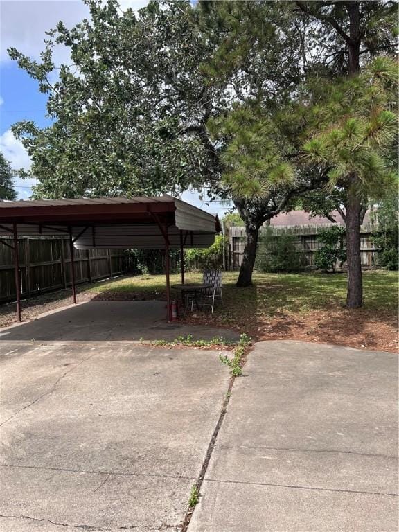 5825 San Saba Dr, Corpus Christi, TX 78407 - view of parking with a detached carport and driveway