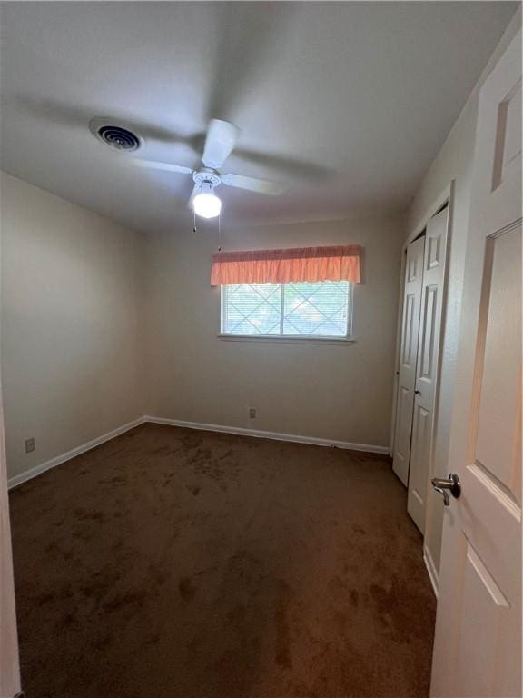 5825 San Saba Dr, Corpus Christi, TX 78407 - unfurnished bedroom featuring carpet floors and a ceiling fan
