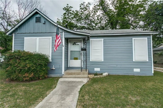 150 E Southcross Blvd, San Antonio, TX 78214 - view of front facade with a front lawn and board and batten siding