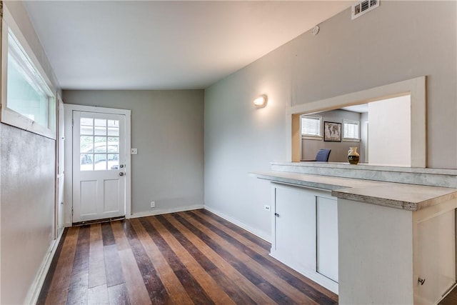 150 E Southcross Blvd, San Antonio, TX 78214 - doorway to outside featuring dark wood-style flooring and baseboards