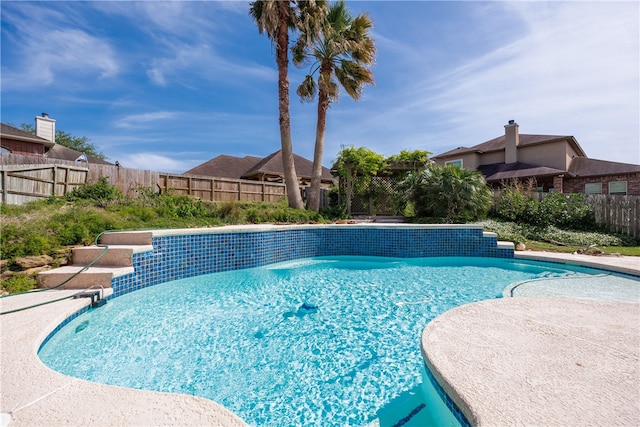 view of swimming pool featuring a patio