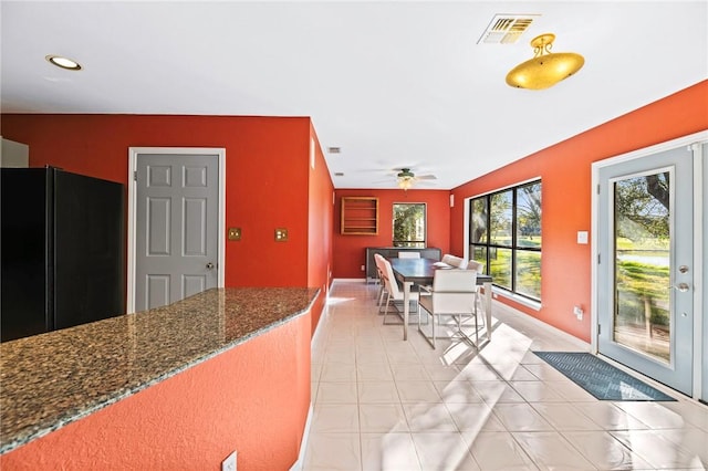 dining area with visible vents, a ceiling fan, recessed lighting, light tile patterned flooring, and baseboards