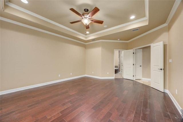 3722 Lake Hawkins Ct, Robstown, TX 78380 - unfurnished room featuring a tray ceiling, ceiling fan, dark wood-style floors, crown molding, and recessed lighting