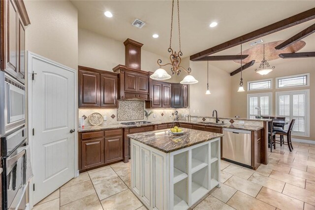 3722 Lake Hawkins Ct, Robstown, TX 78380 - kitchen featuring stainless steel appliances, a peninsula, a sink, decorative backsplash, and dark stone counters