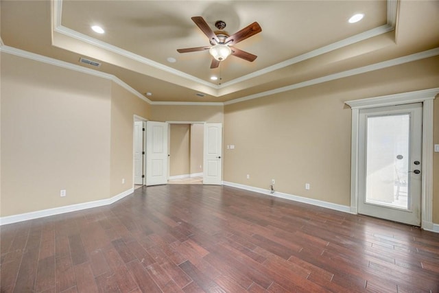 3722 Lake Hawkins Ct, Robstown, TX 78380 - empty room with a tray ceiling, a ceiling fan, dark wood-type flooring, crown molding, and baseboards