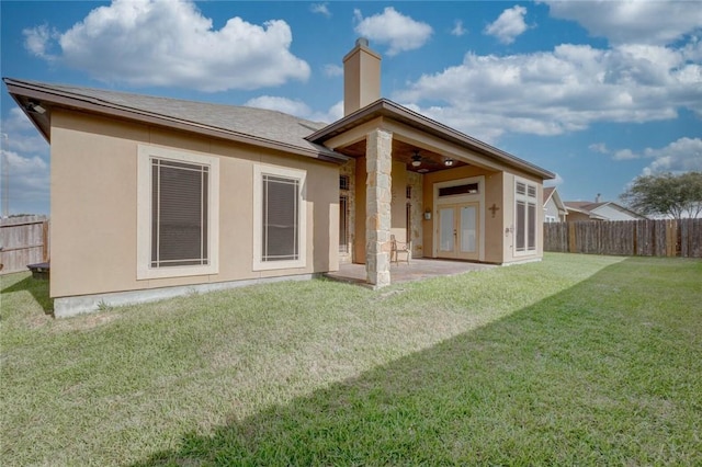 3722 Lake Hawkins Ct, Robstown, TX 78380 - back of property featuring ceiling fan, a patio, stucco siding, and a chimney