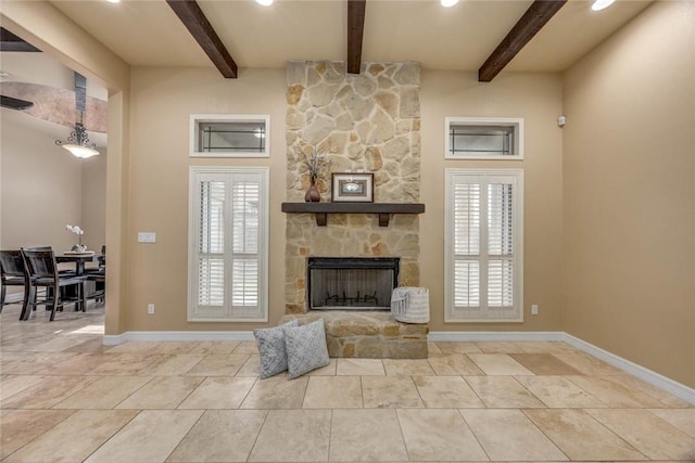 3722 Lake Hawkins Ct, Robstown, TX 78380 - living room featuring baseboards, beamed ceiling, a stone fireplace, and recessed lighting
