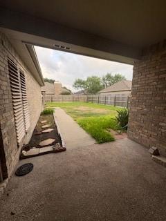 7502 Lourdes St, Corpus Christi, TX 78414 - view of yard featuring a patio area