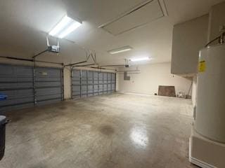 7502 Lourdes St, Corpus Christi, TX 78414 - garage with water heater and a garage door opener
