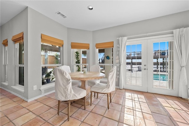 dining room featuring recessed lighting, french doors, visible vents, and light tile patterned flooring