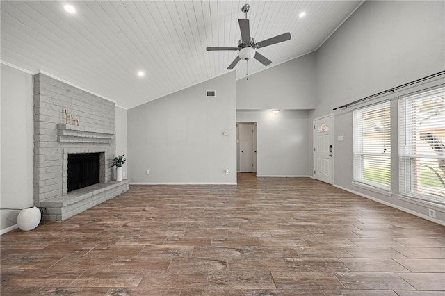 4026 Brownwood, Corpus Christi, TX 78410 - unfurnished living room with wood finished floors, ceiling fan, recessed lighting, a brick fireplace, and baseboards